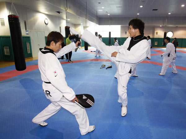 South Korean taekwondo competitors going for gold at the London Olympics know the price of failure will be extreme. Such is Koreans' pride in their national sport that coming home without a gold medal would be tantamount to treason. S Koreans fear being branded taekwondo traitors