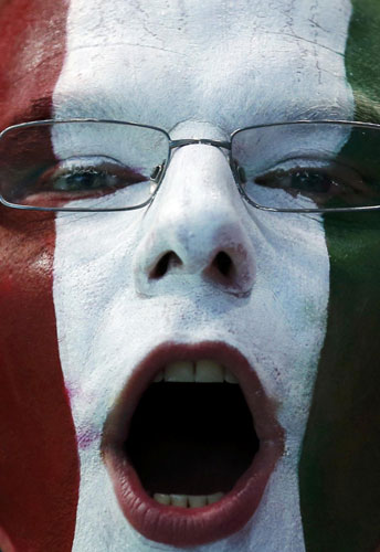 A series of pictures show painted faces of fans from different countries during the London 2012 Olympic Games. Painted faces of Olympic fans
