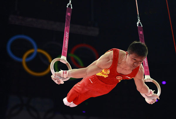 Chen Yibing of China competes in the rings during the men's gymnastics team final in the North Greenwich Arena during the London 2012 Olympic Games July 30, 2012.  Olympic preview: China in action on day 10