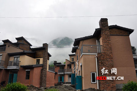 四川都江堰土地流轉(zhuǎn)試水 震區(qū)災民全換新房(圖)