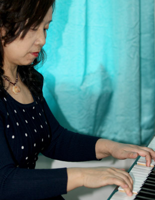 賀加慧:三尺講臺 34年堅(jiān)守