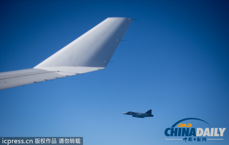 G20峰會(huì)結(jié)束 瑞典戰(zhàn)機(jī)靠近默克爾專機(jī)（圖）