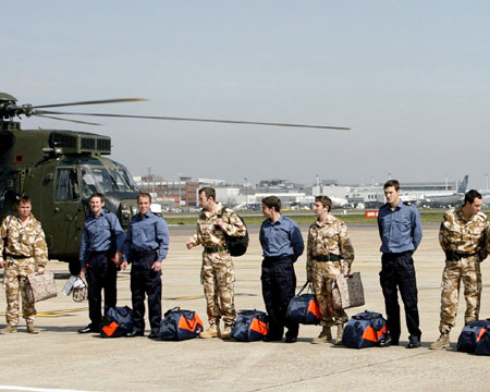 British military personnel arrive home
